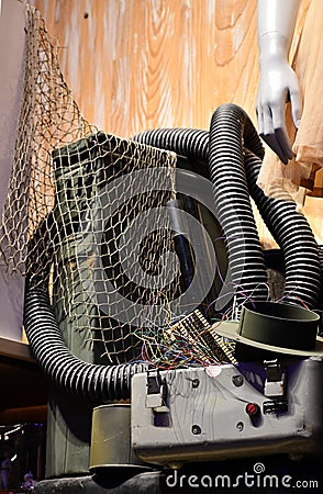 Closeup vertical shot of a pile of various useless electrical work instruments in a barn Stock Photo