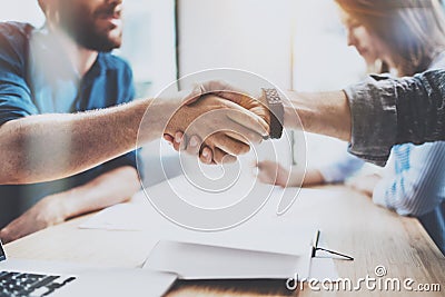 Closeup view of Business male partnership handshake. Photo two coworkers handshaking process. Successful deal after great Stock Photo