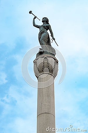 Closeup view of The Call to Arms, a 17-foot bronze statue of the Goddess Columbia. She stands on Editorial Stock Photo