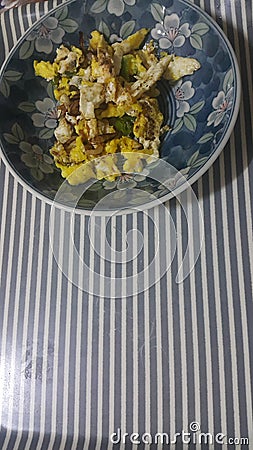 Closeup view of fried egg omelet dish in a fry pan Stock Photo