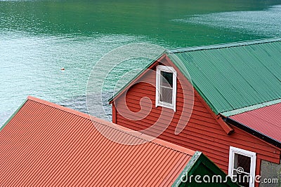Closeup view of a houses at the shore in Refviksanden Beach Stock Photo