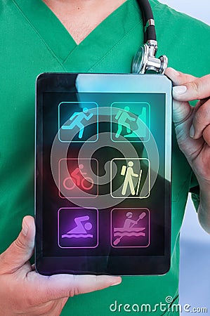 Closeup view of male physiotherapist holding touchpad Stock Photo