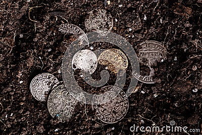 Closeup view of medieval European gold and silver coins.Old Polish coins.Zygmunt III Waza.Ancient gold and silver coins. Stock Photo