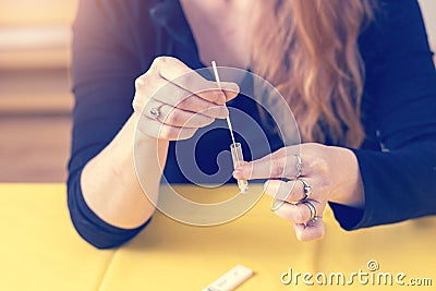 Closeup view of one of the steps of preventive control of Covid-19 by a self-testing kit Stock Photo