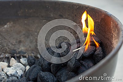 Igniting the char Stock Photo