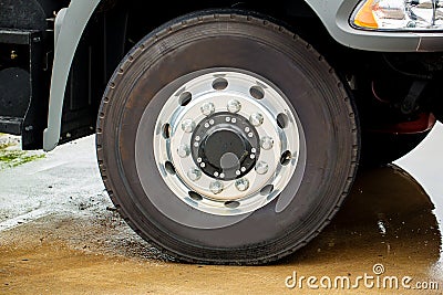 Closeup view of a rubber tire on a truck.Truck Wheels and Tires Closeup Photo. Stock Photo