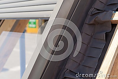 Closeup view of side parts with insulation and sponge seals of roof window skylight or dormer. Stock Photo