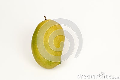 Single Kesar mango on white Stock Photo