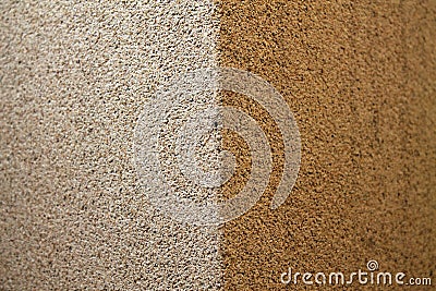 Closeup view of two-sided wall with white and brown bumpy grunge texture backround Stock Photo