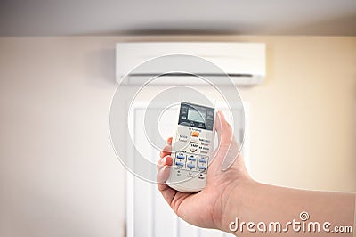 Closeup view about using some appliance such as air condition Stock Photo