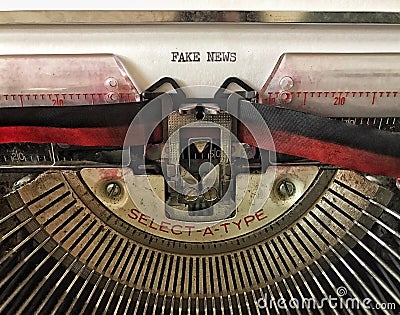 Closeup of vintage typewriter with the words Fake News Stock Photo