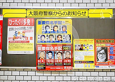 Closeup wanted criminals from The Osaka city police and warning label of Japanese snatch Editorial Stock Photo