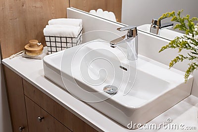 closeup of washbowl and mixer tap in washroom Stock Photo