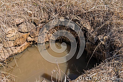 Water well at remains of old fortress Stock Photo