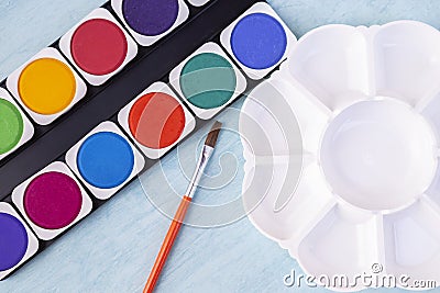 Closeup watercolor palette in flower shape and colorful watercolor tablet Stock Photo