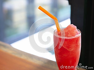 Closeup watermelon smoothie on wood table, selective focus Stock Photo