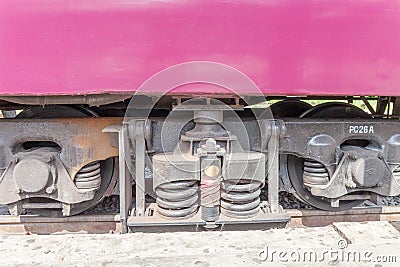 Closeup wheel break and suspension system of diesel train Stock Photo