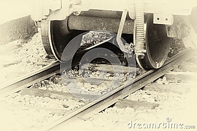 Closeup wheel of a train on the railroad at the station. with image vintage tone Stock Photo