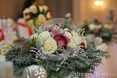 Closeup of white roses wedding bouquet at reception Stock Photo