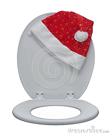 Closeup of White toilet bowl and Santa Claus hat. Stock Photo