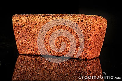 closeup whole rectangular rye bread with sesame seeds Stock Photo