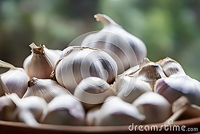 Closeup of whole unpeeled garlic in a bowl Stock Photo