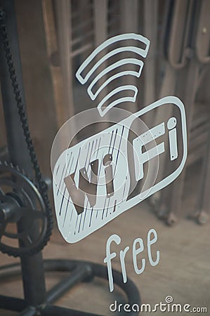 wifi free sign on cafe window in the street Stock Photo