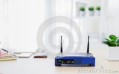 Closeup of a wireless router on living room at home Stock Photo