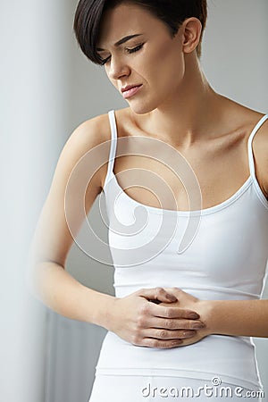Closeup Woman Body Feeling Pain In Stomach, Stomach Ache Stock Photo