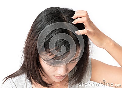 Closeup woman hand itchy scalp, Hair care Stock Photo