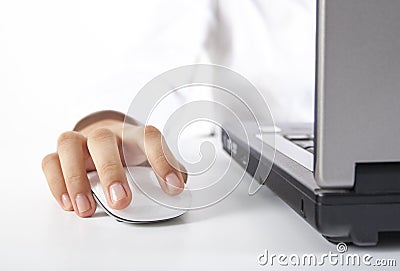 Closeup woman hand on mouse Stock Photo