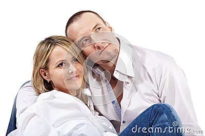 Closeup woman and man sit on floor Stock Photo