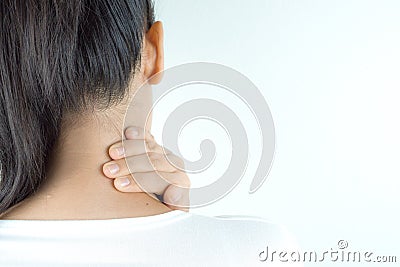 Closeup woman neck and shoulder feeling exhausted and suffering from neck and shoulder pain and injury on white background. Health Stock Photo