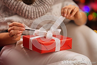 Closeup on woman opening Christmas present box Stock Photo