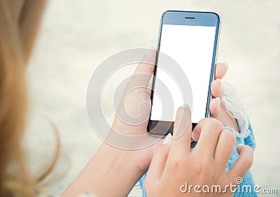 Closeup women using phone from back Stock Photo