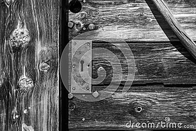 Closeup of a wooden door of a typical Alpine hut, Dolomite Alps in South Tirol Stock Photo