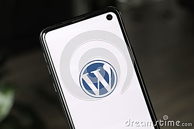 Closeup of Wordpress logo on smartphone screen Editorial Stock Photo