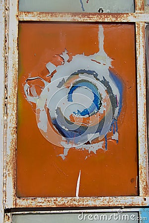Worn-Out Graffiti On Glass Windowpane Stock Photo
