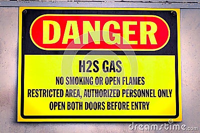 Closeup of a yellow Danger H2S Gas sign Stock Photo