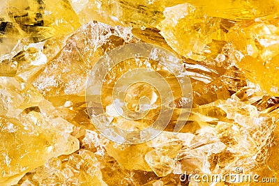 Closeup of yellow honey calcite mineral stone, pattern background Stock Photo