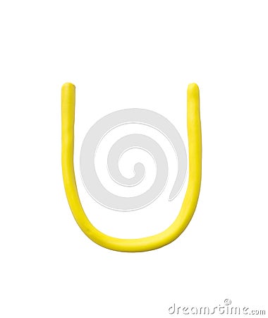 Closeup yellow plasticine for kid in U alphabet isolated on white background with clipping path Stock Photo