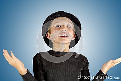 closeup of young boy content and a little bit surprised expression Stock Photo