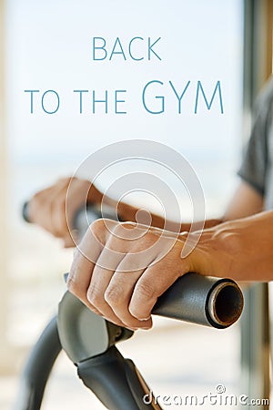 Man working out and text back to the gym Stock Photo