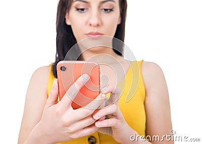 Closeup young woman browse on mobile phone, isolated on white background. Close up female holding smartphone. Focus on phone. Stock Photo