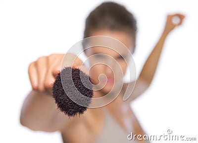 Closeup on young woman fencing with brush Stock Photo