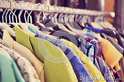 Clothes hanging on a rack in a flea market Stock Photo