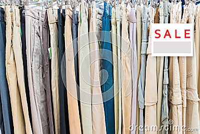 Clothes hanging on a rack in a flea market Stock Photo