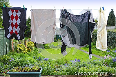 Clothes hanging from washing line Stock Photo