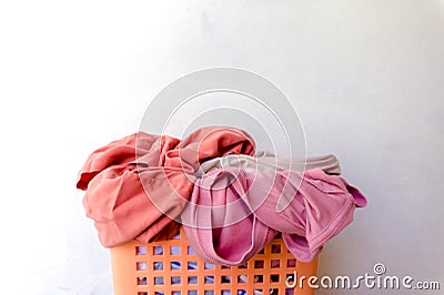 Clothes that have already been worn and placed in a basket Stock Photo