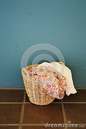 Clothes in laundry basket Stock Photo
